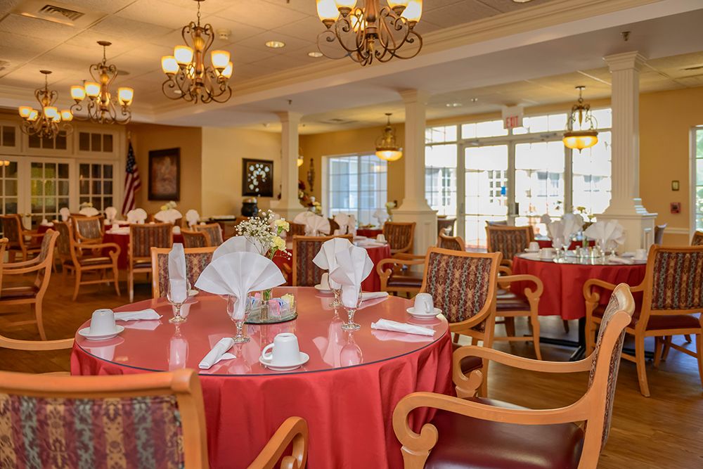 Interior view of the dining room in The Bridge At Ocala senior living community.