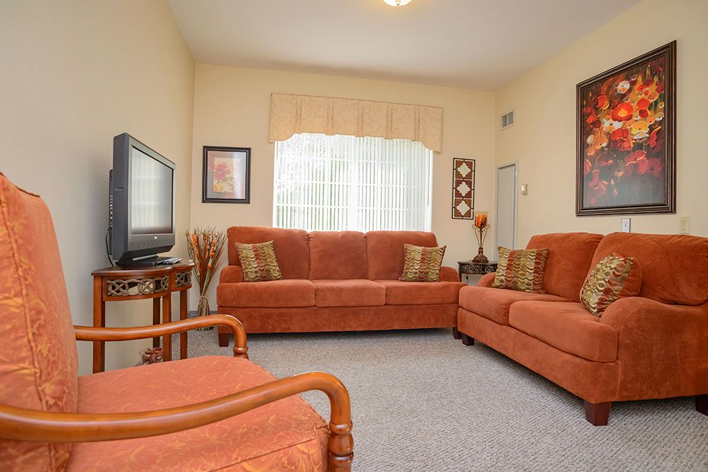 Interior view of The Bridge At Ocala senior living community featuring modern decor and electronics.