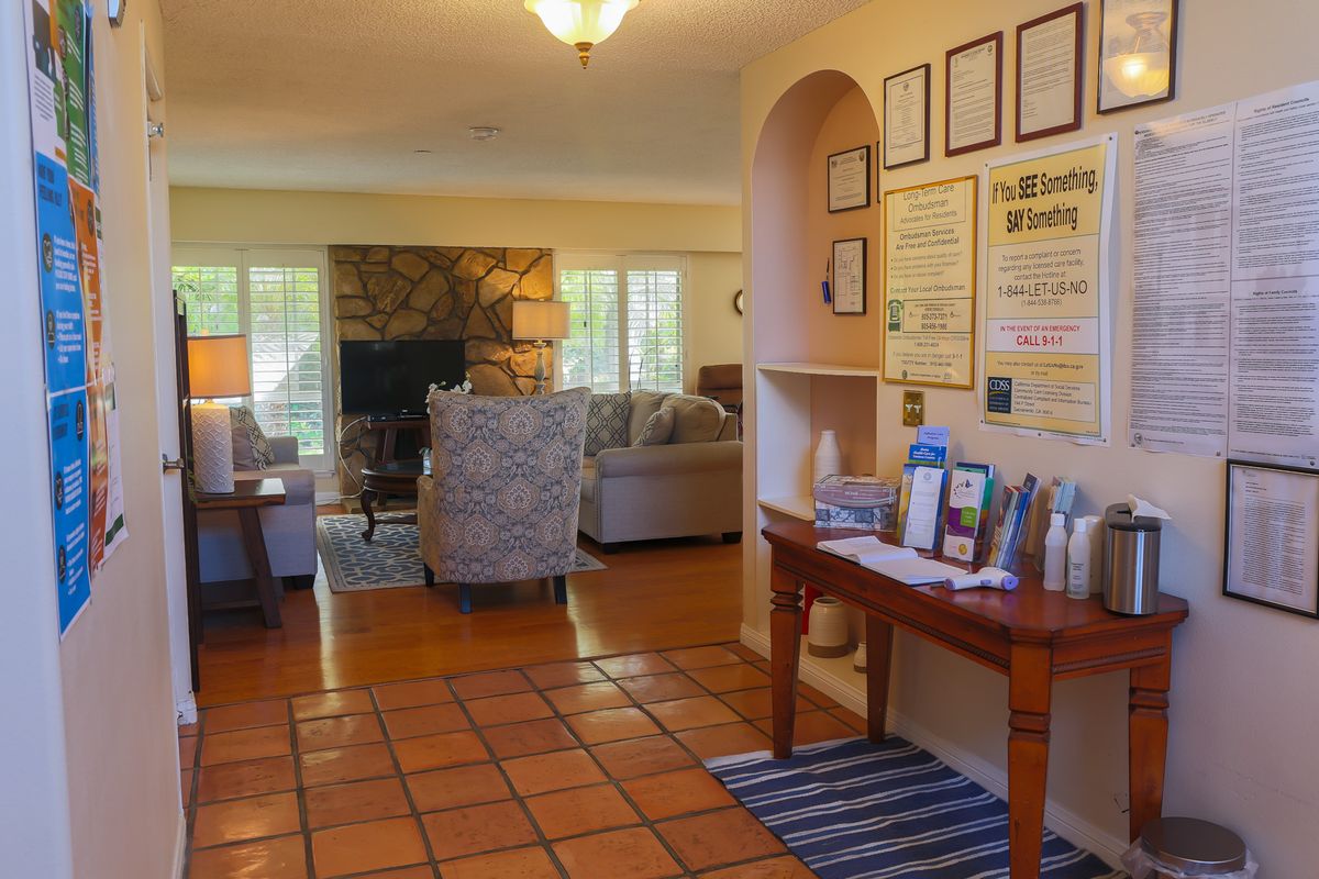 Interior view of a living room at Ocean Breeze Estates at Beechwood senior living community.