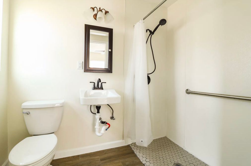 Simple and easy to walk in showers make our beautiful bathrooms the best option for your loved one