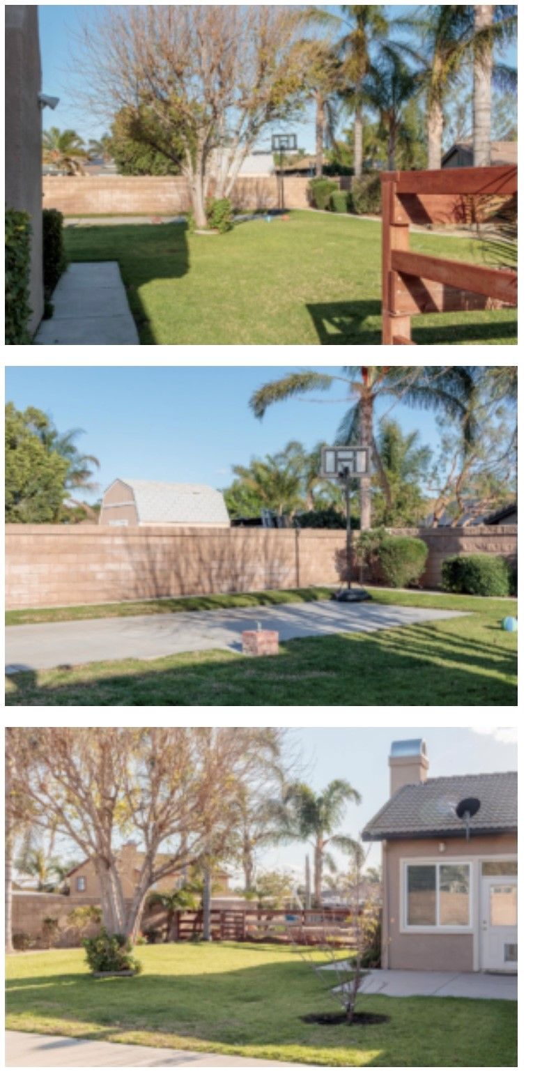 Enjoy our beautiful backyard with beautiful landscaping, a nice breeze, and lovely flowers and fruit trees.