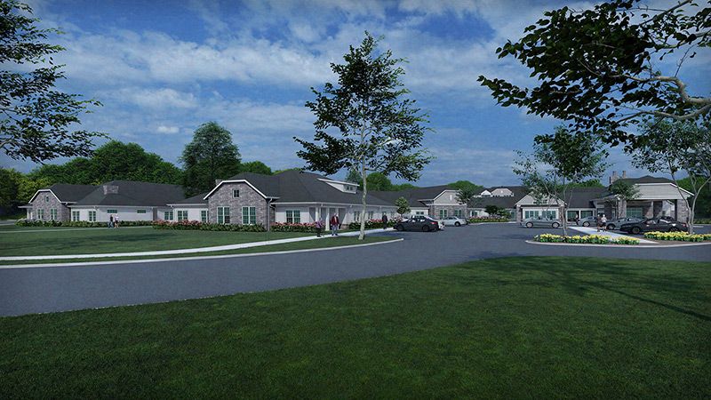 Senior residents enjoying outdoors at Quincy Place Senior Living in a suburban neighborhood.