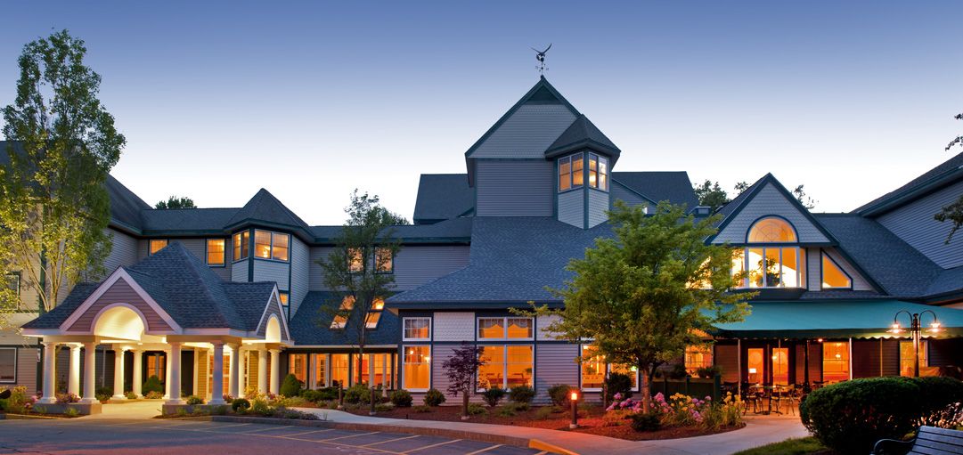 Senior living community, RiverWoods Manchester, featuring suburban housing and resort-style amenities.