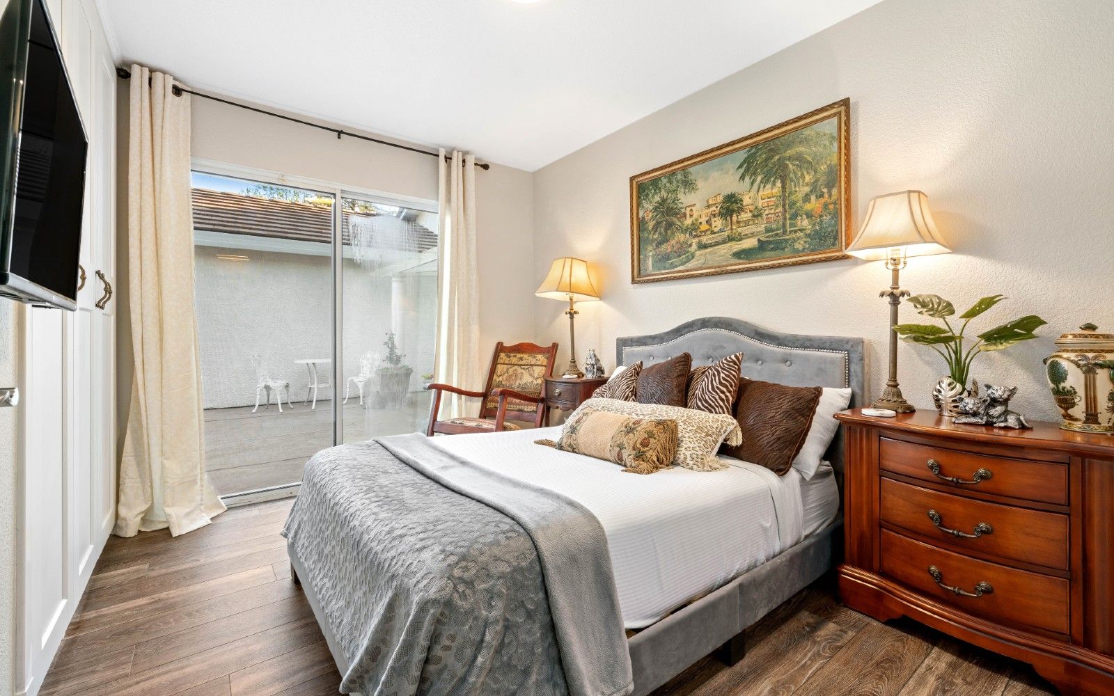 Senior resident enjoying in a well-decorated room at Hollister Care Home with modern amenities.
