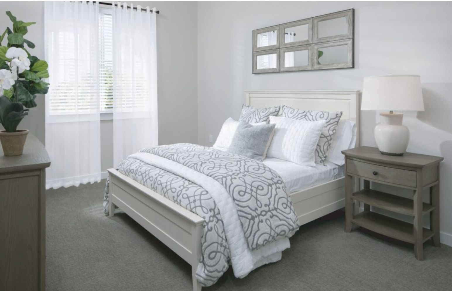 Interior design of a bedroom at The Preserve at Spring Creek senior living community.