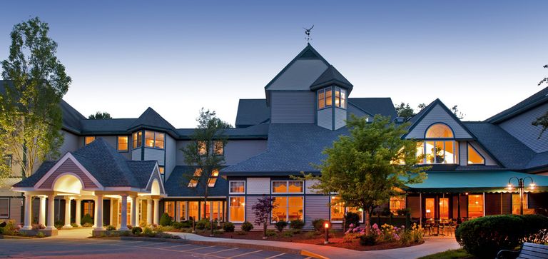 Senior living community, RiverWoods Manchester, featuring suburban housing and resort-style amenities.